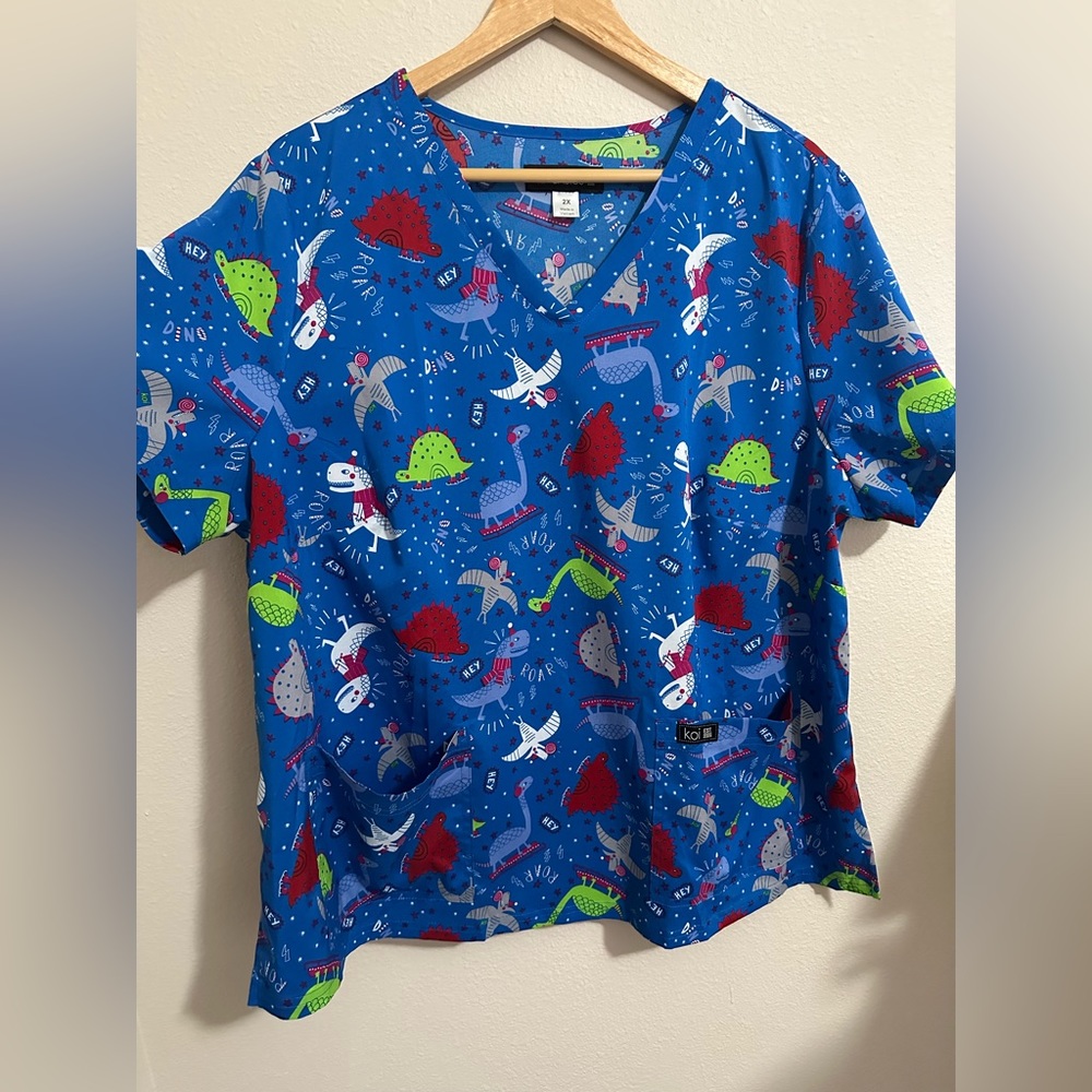 2X Royal Blue Holiday Dino Theme Scrub Top by KOI